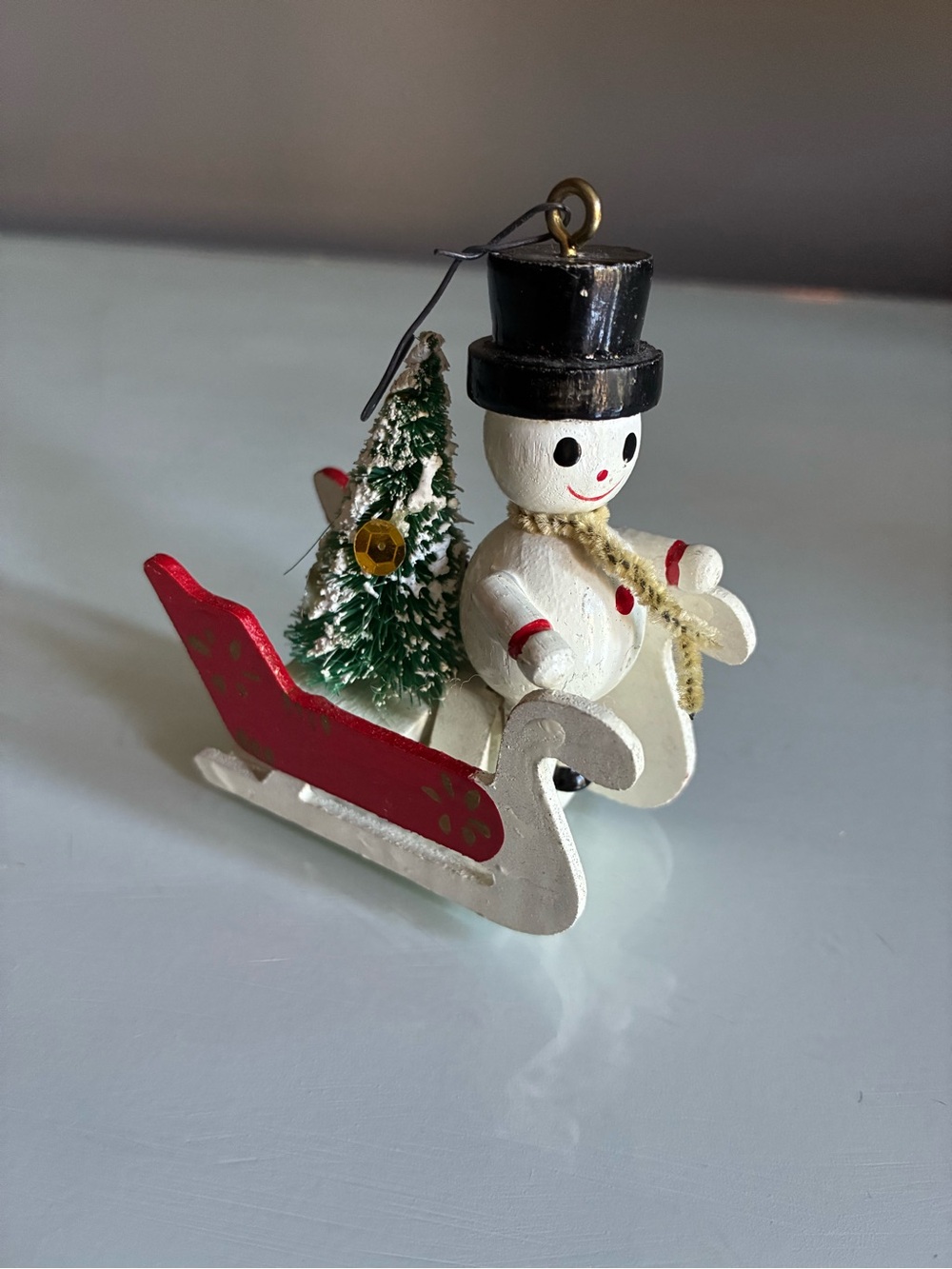 Vintage Holiday Snowman on Sleigh Ornament - White, Red, Green